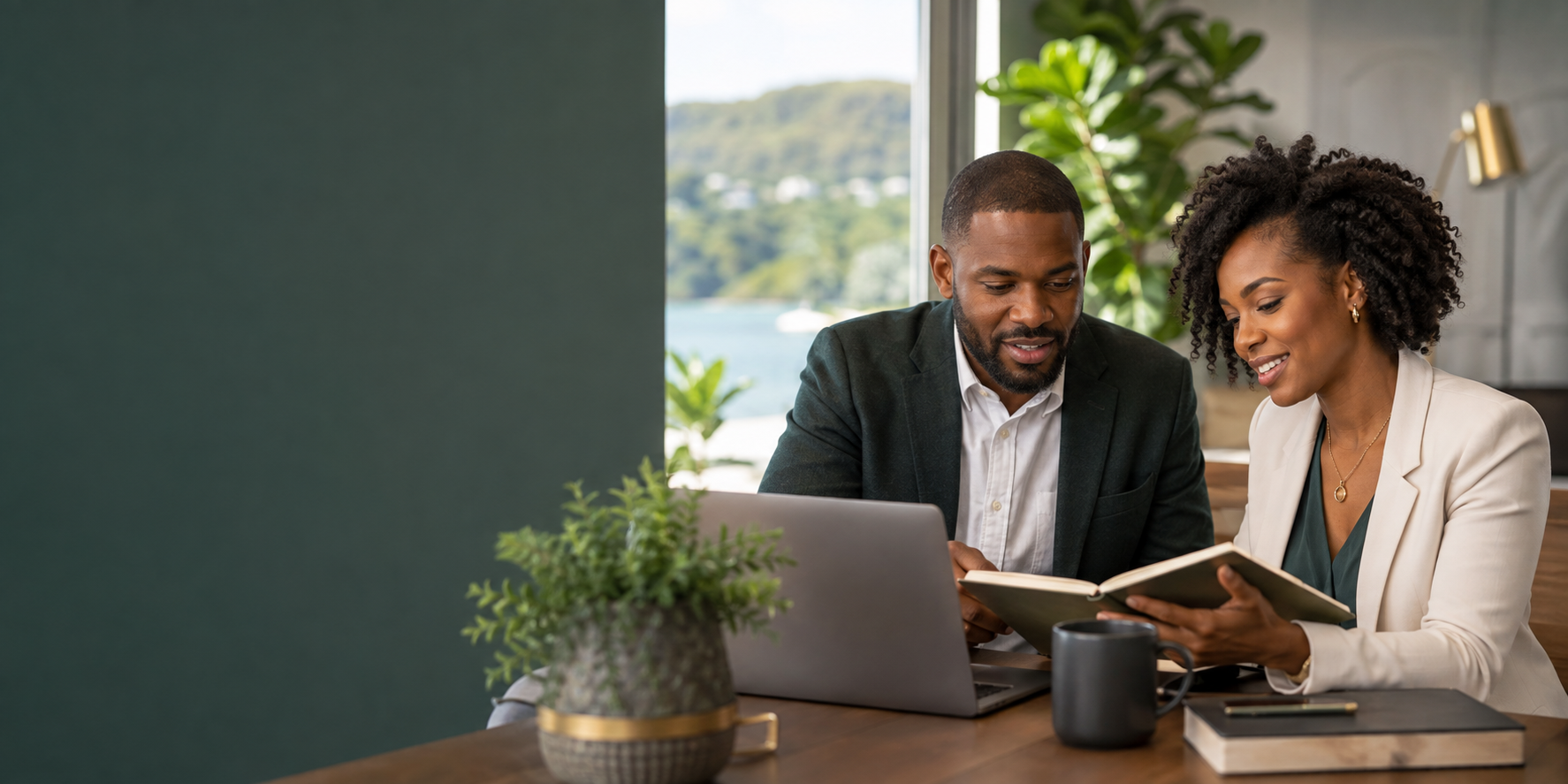 Caribbean professionals collaborating at a modern workspace